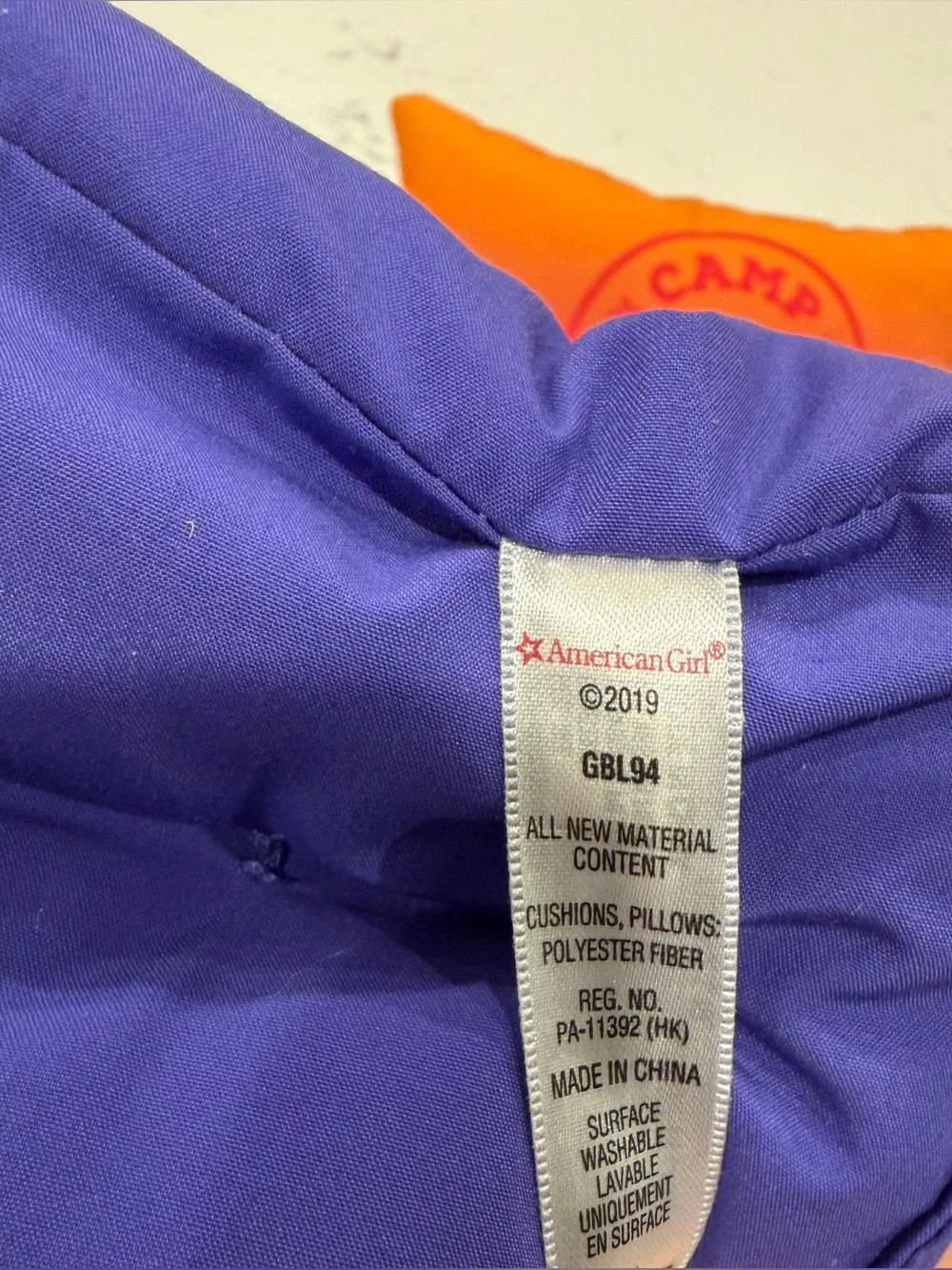 American Girl Camp Hangout ombre pillow and two purple cushions